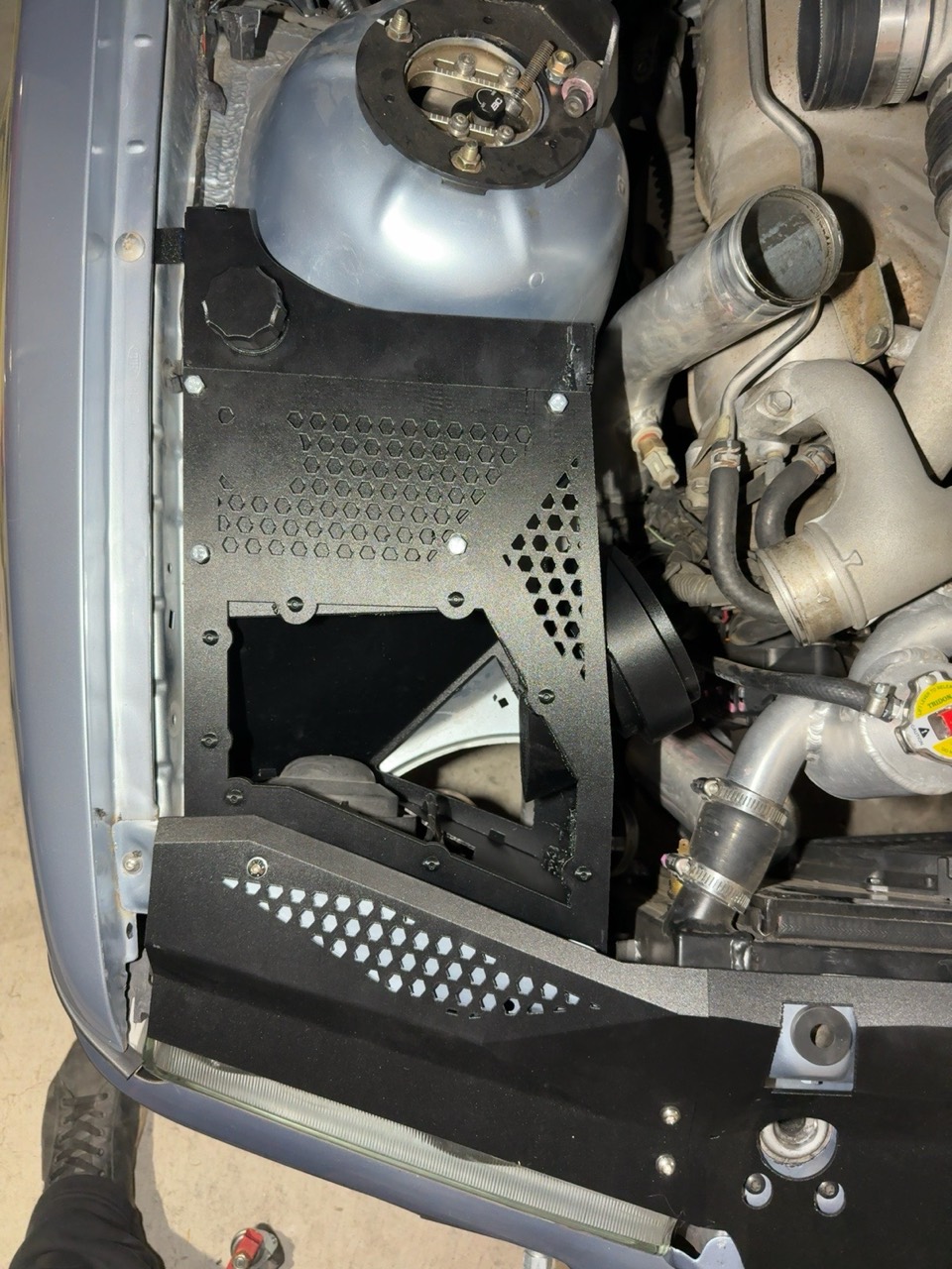 Original photograph of the E36 3D-printed airbox and reservoir fit-check prototype following the shock tower in the engine bay
